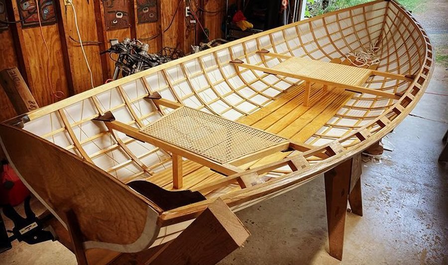 Skin-on-frame boat — interior with caned seats