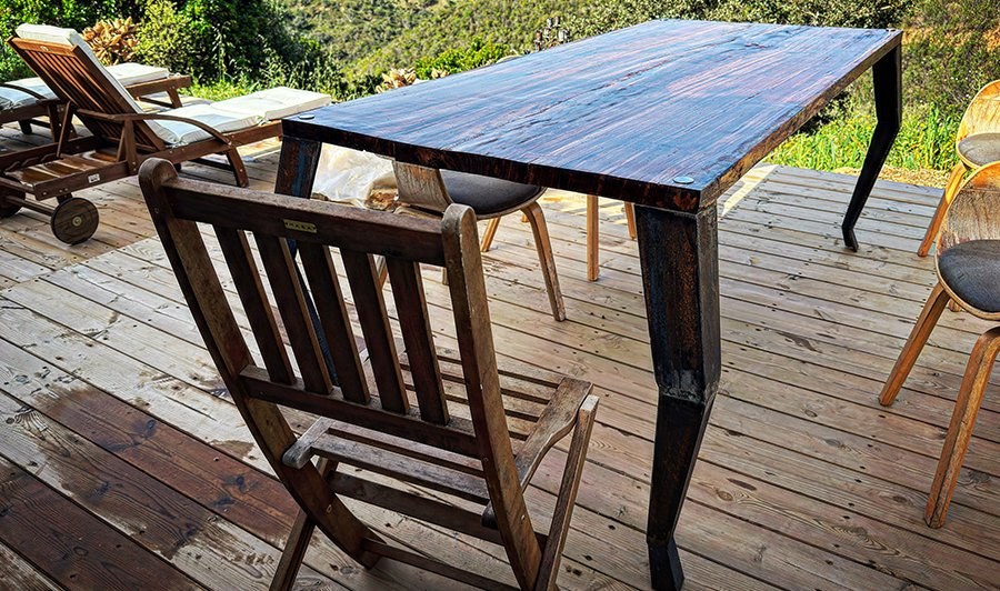 Steel-and-hardwood table on the deck